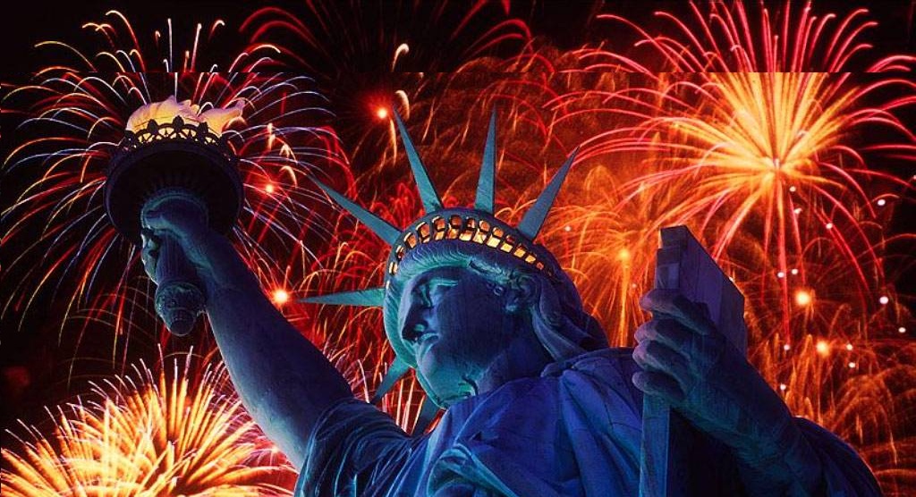 Fireworks behind the statue of liberty 