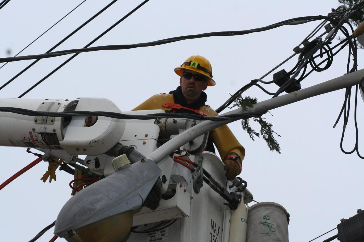 Electric Lineman in Bucket Truck